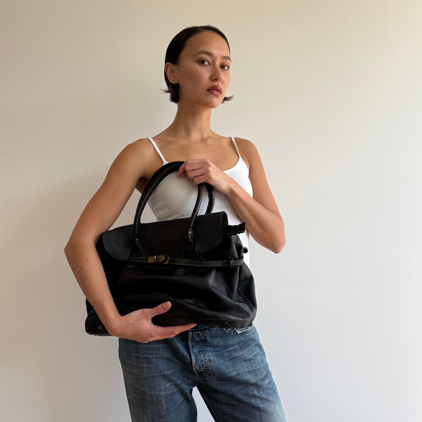 Navy leather ‘firkin’ bag - One Size