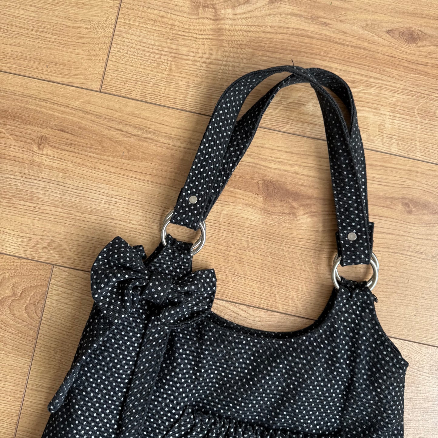 Black polka dot tote bag