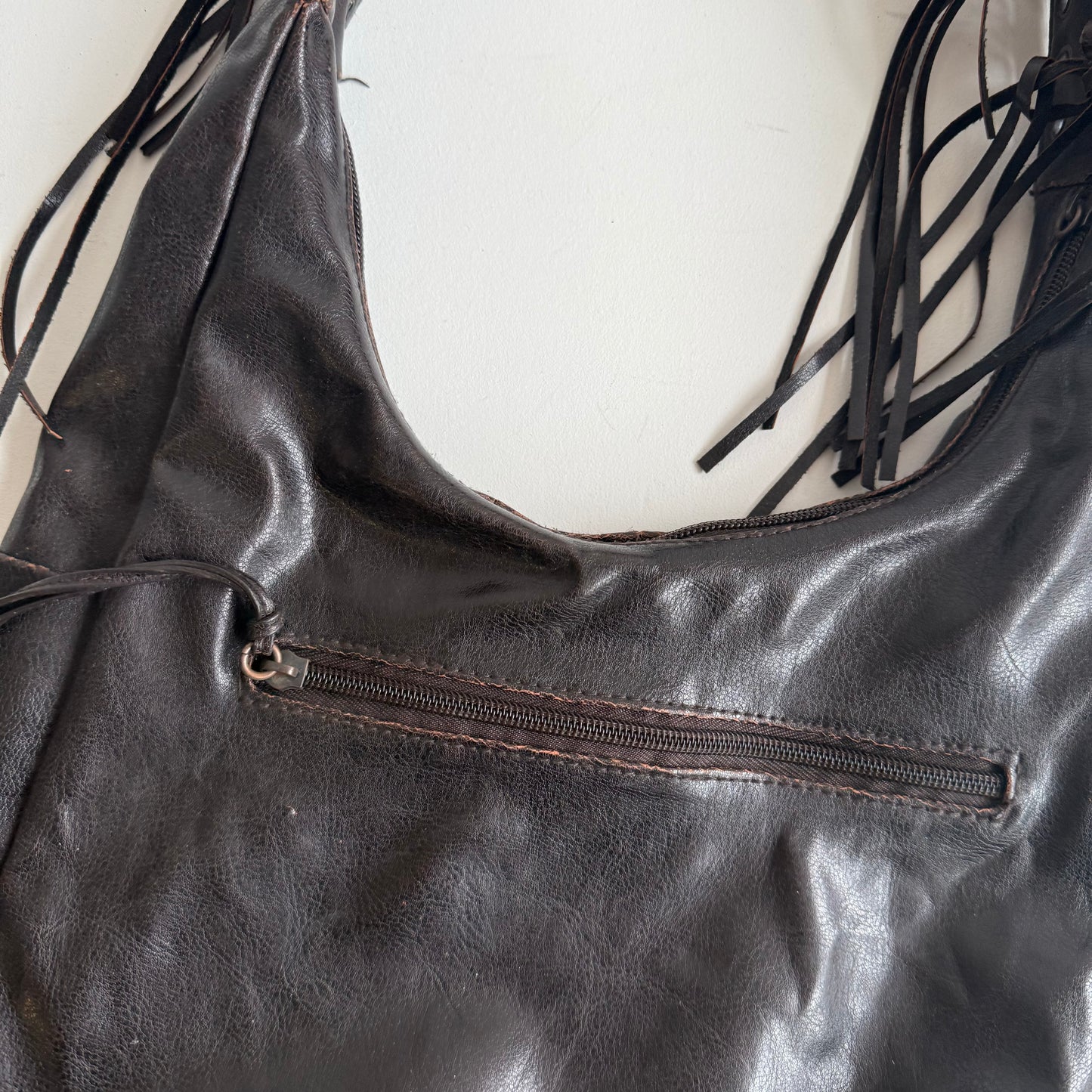 Brown leather tassel bag
