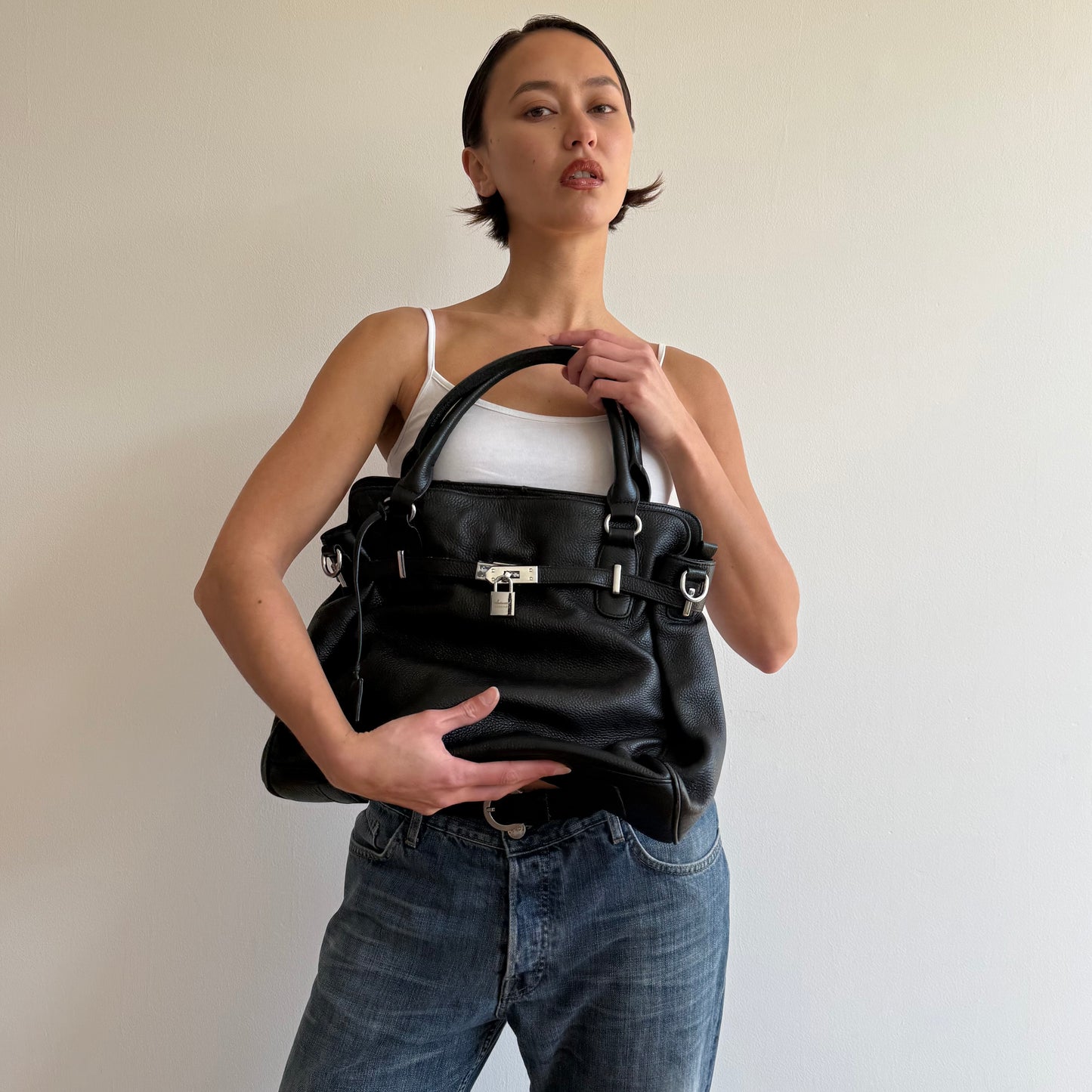 Black leather ‘firkin’ locket bag - One Size