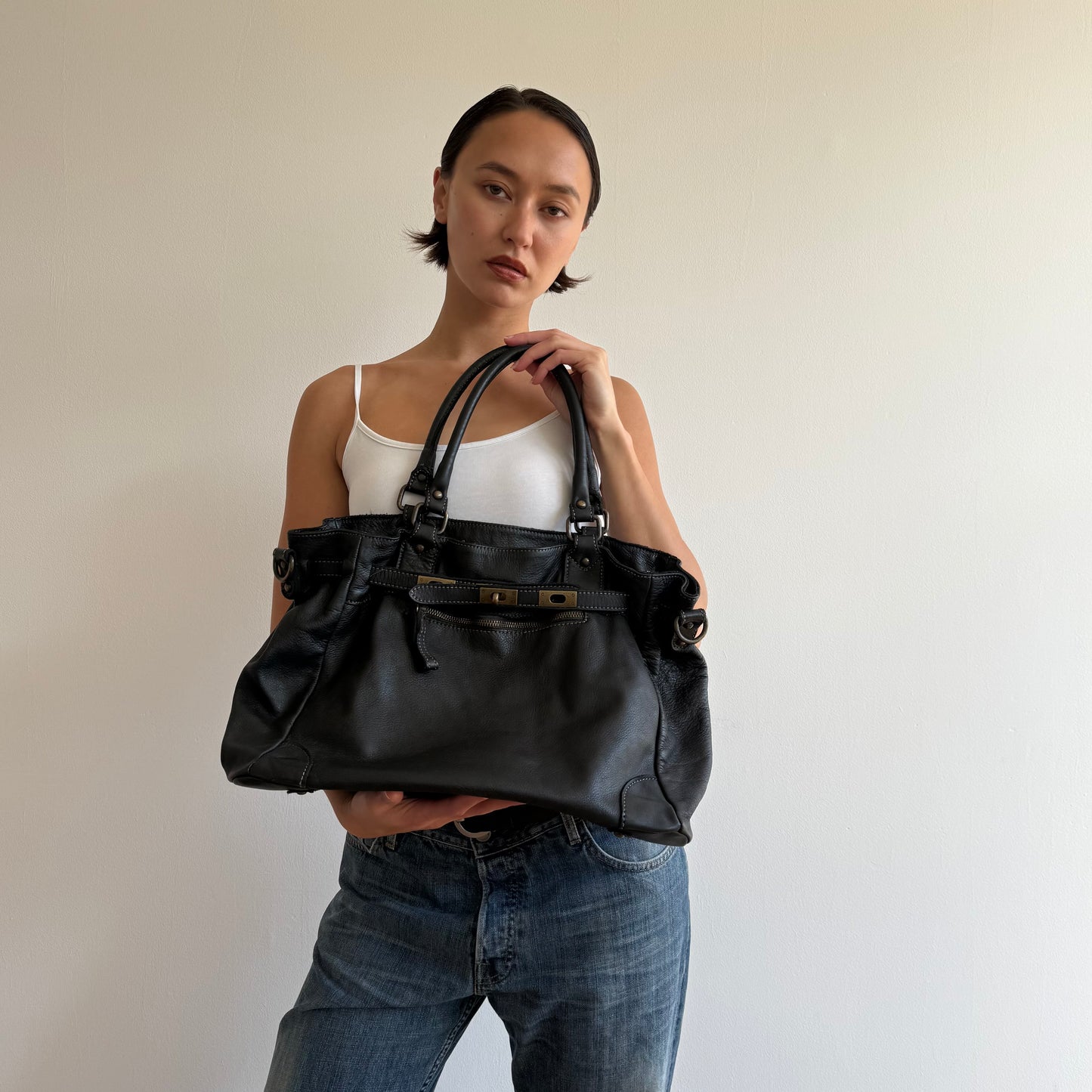 Black leather ‘firkin’ bag - One Size
