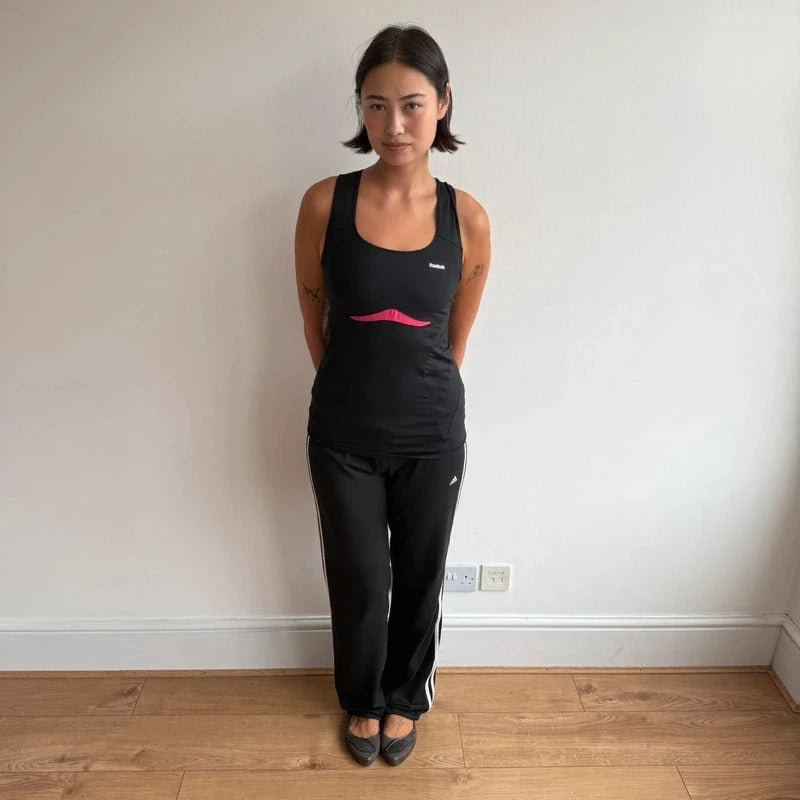 Black + pink sporty Reebok top - Size M