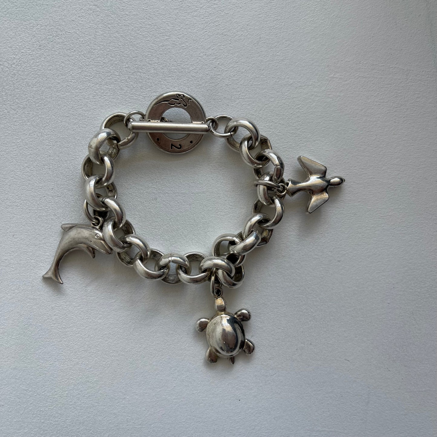 Silver charm bracelet - Size O/S