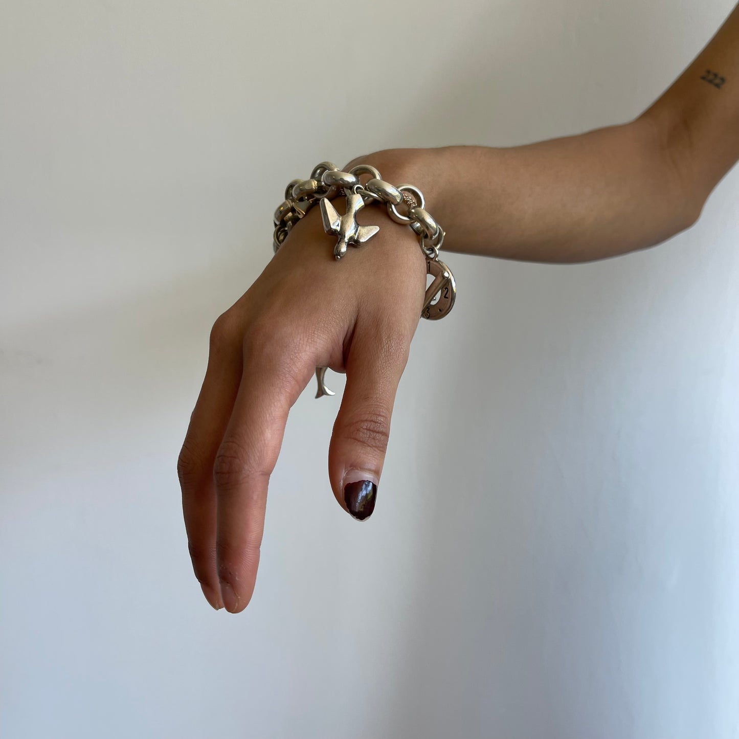 Silver charm bracelet - Size O/S
