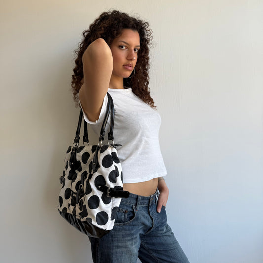 White polka dot bag