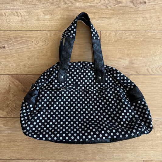 Black polka dot bowling bag