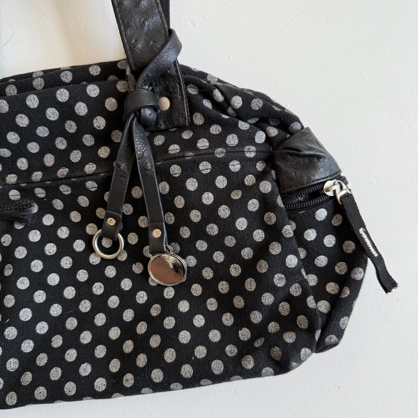 Polka dot bowler bag