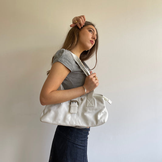 White leather buckle bag