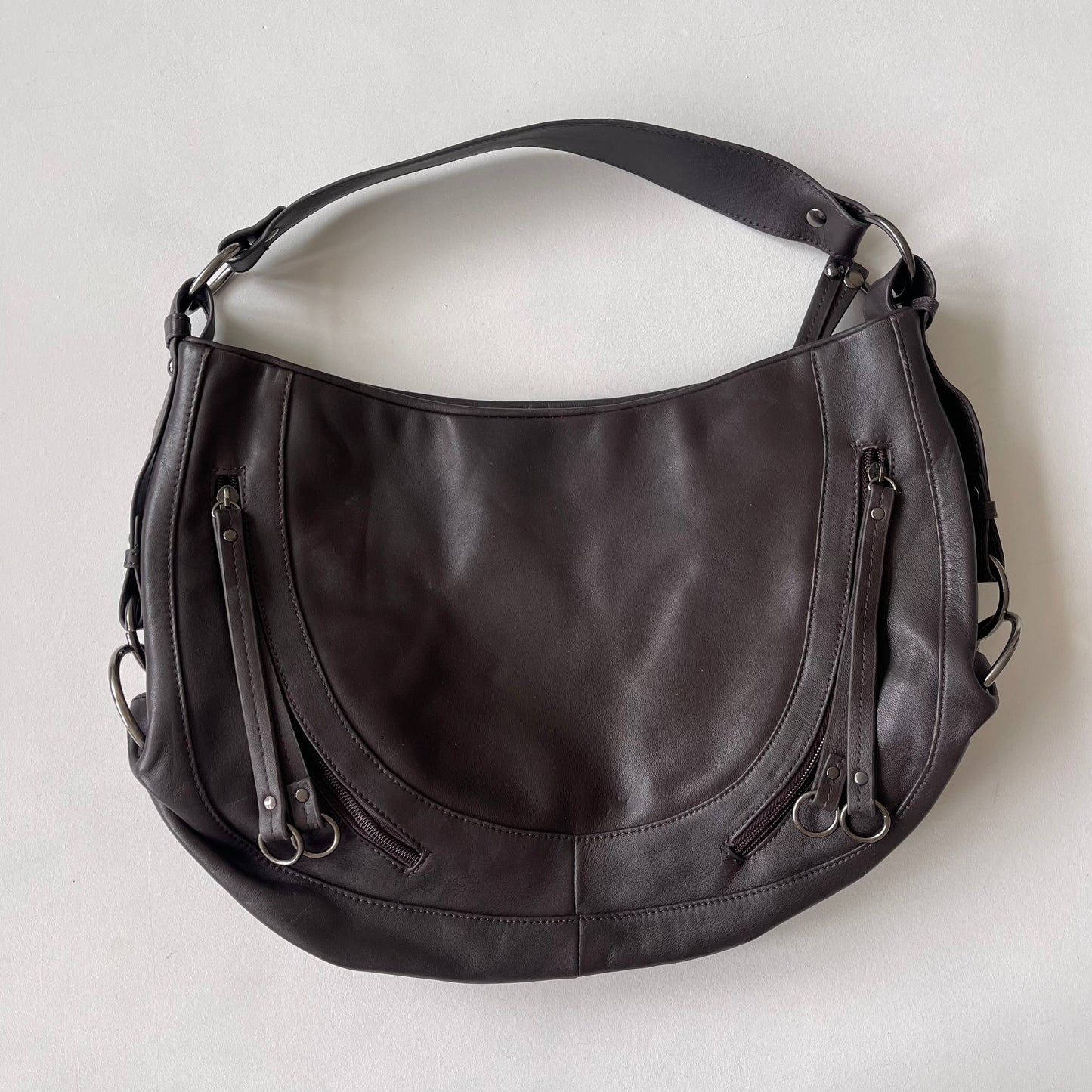 Brown leather crescent bag