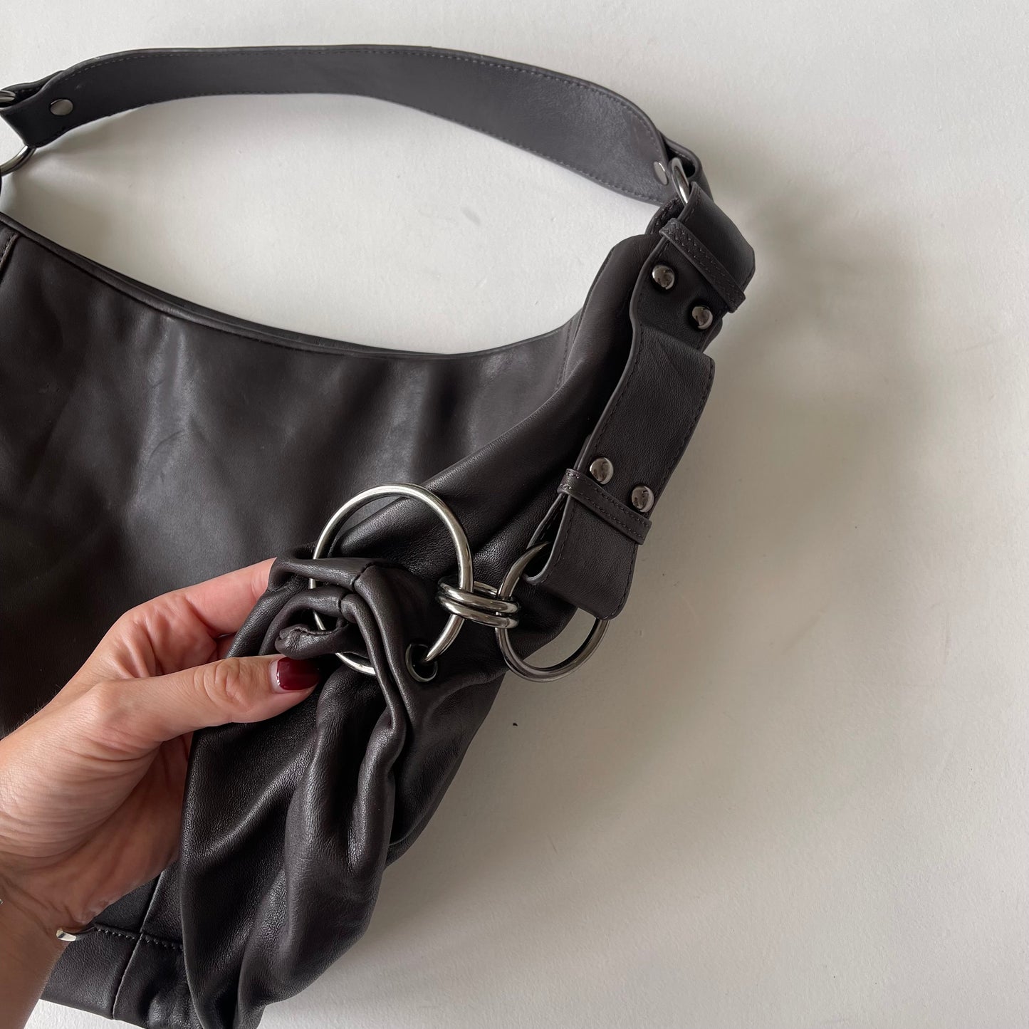 Brown leather crescent bag