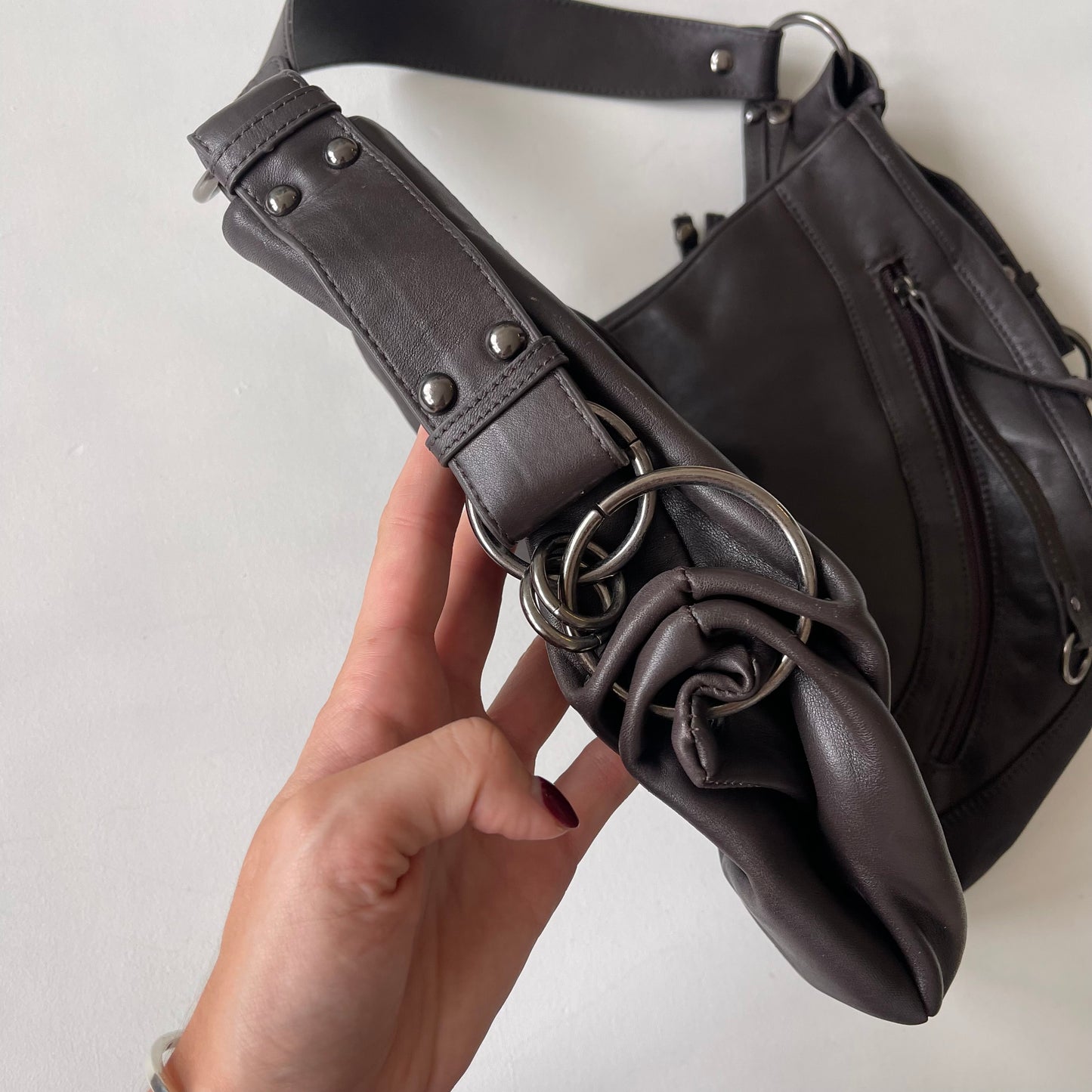 Brown leather crescent bag